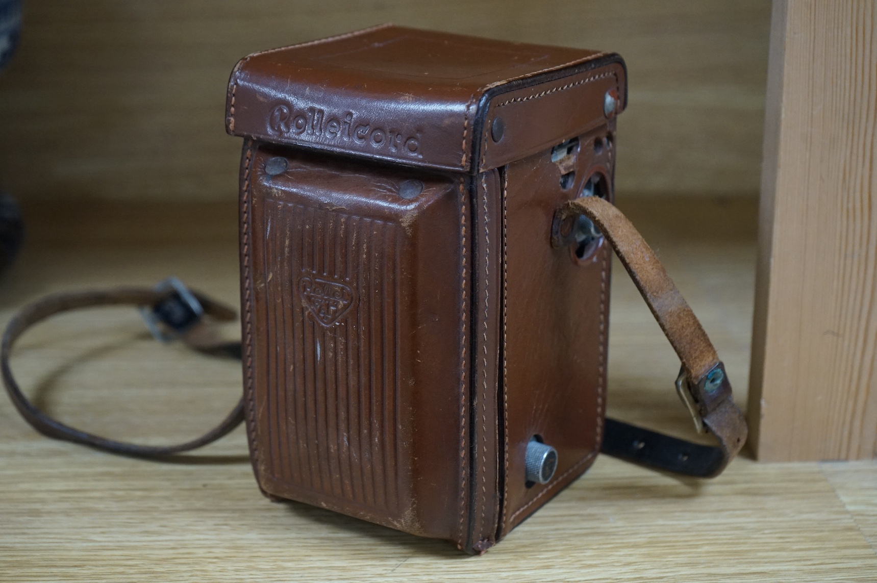 A vintage Rolleicord TLR camera, cased.